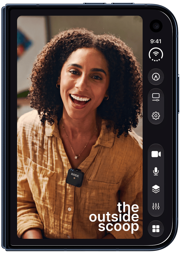 iPhone Duo folded, with Camo Studio on the cover screen streaming a host wearing a clip-on wireless mic